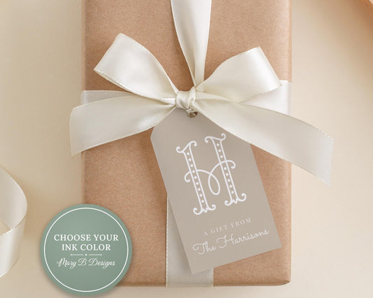 A gift box with a white ribbon and a tag that reads "A gift from The Harrowers".