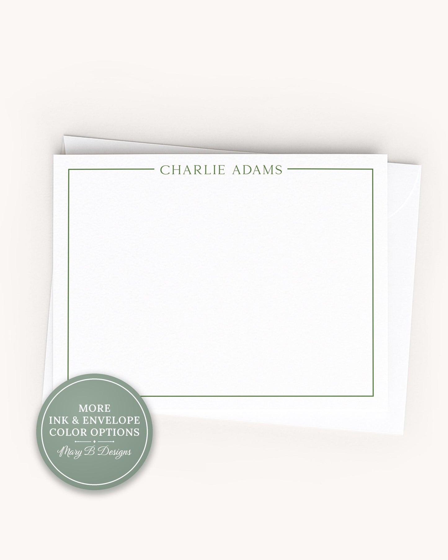 A white card with a green border, featuring the name "Charlie Adams" written in green text.