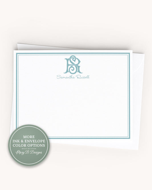 A white card with a blue border, featuring a monogram logo and the text "Samuel Russell" printed on it.