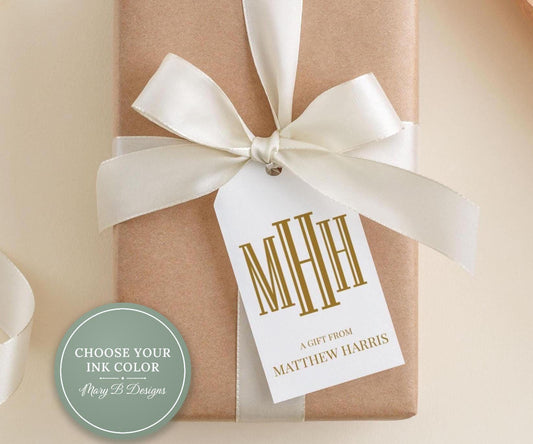A gift wrapped in brown paper with a white ribbon and a gold-colored tag that reads "A Gift from Matthew Harris".