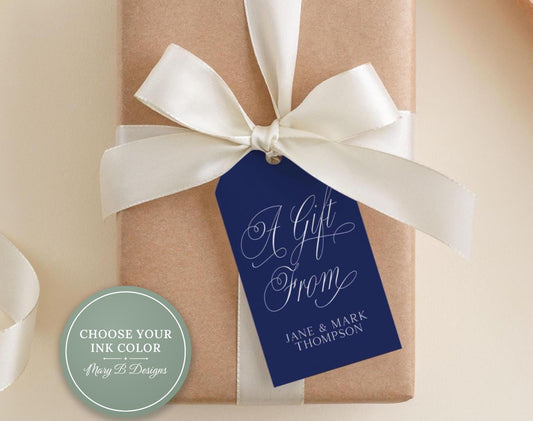 A gift wrapped in brown paper with a white ribbon and a blue gift tag that reads "A Gift From Jane & Mark Thompson".