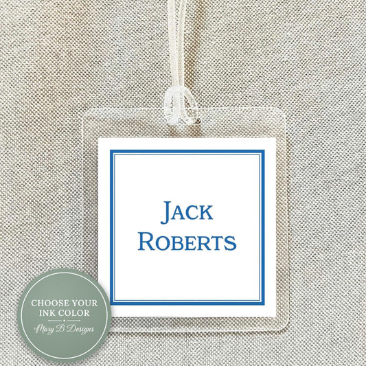 A clear plastic name tag with a blue border, displaying the name "Jack Roberts" in white text.