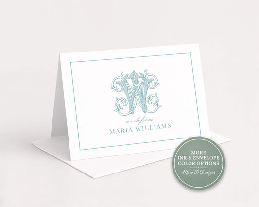 A white card with a teal and blue monogram design, featuring the initials 'W' and the text 'a note from MARIA WILLIAMS'.