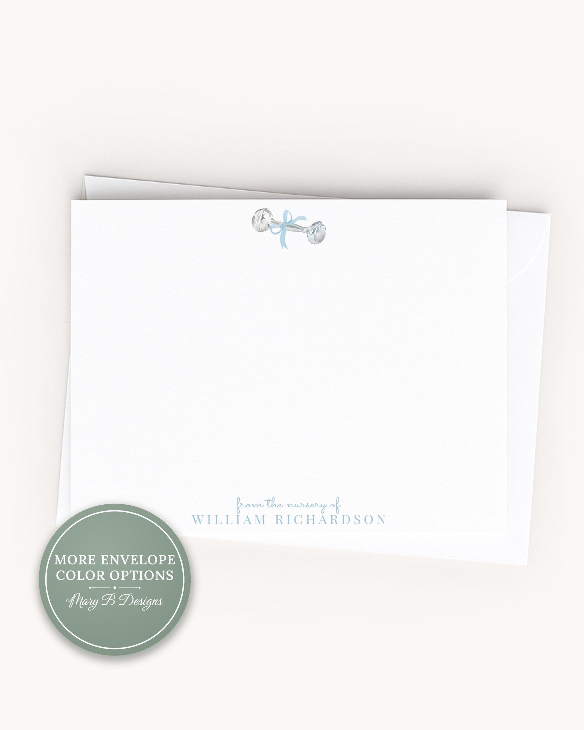 A white card with a personalized message and a decorative key design on the top.